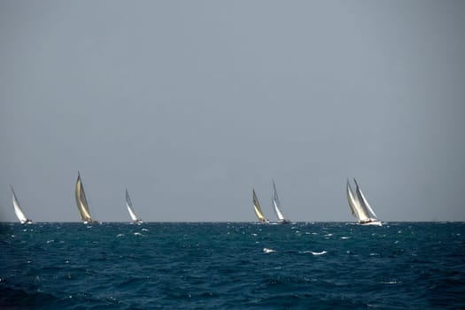 A strong wind regatta in barcelona Sailing ship in a strong wind. Yachting