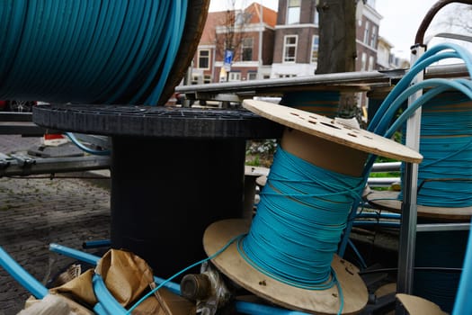 City communication wires for repair supplies for urban infrastructure and road renovation. Cable reels for road works