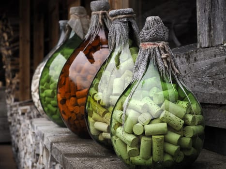 many wine bottle cork inside glass jar detail