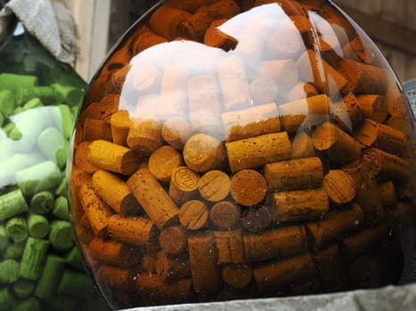 many wine bottle cork inside glass jar detail