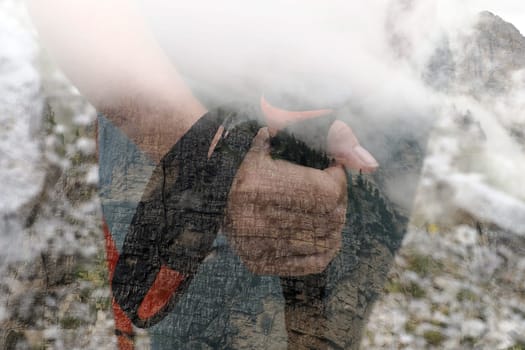 Trekking in Dolomites mountains on a cloudy day double exposure image idea concept view