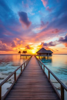 Sunset on Maldives island, luxury water villas resort and wooden pier. Beautiful sky and clouds and beach background for summer vacation holiday and travel concept. AI Generated