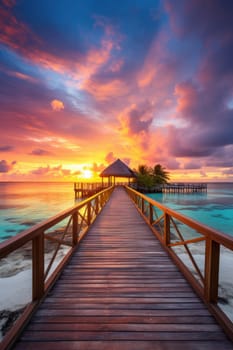 Sunset on Maldives island, luxury water villas resort and wooden pier. Beautiful sky and clouds and beach background for summer vacation holiday and travel concept. AI Generated