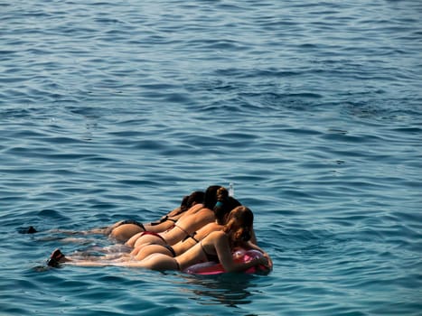 Snorkelist in crystal clear water of Adriatic sea in Brela on Makarska Riviera, Dalmatia Croatia