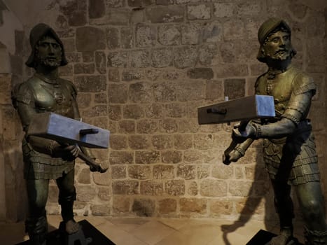 bronze jacks of clock tower Dubrovnik Croatia medieval town