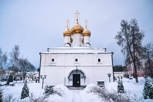 Front view of Russian white Orthodox church in winter