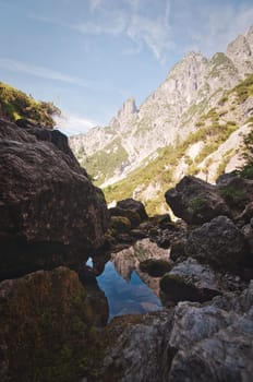 Vertical shot of the Birnhorn mountain from Birnabachloch rock cave in Leogang, Salzburg, Austria