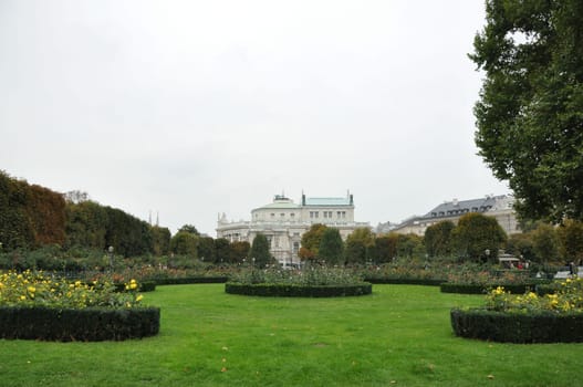 Park with yellow roses and flower islands in the Volksgarten in Vienna, Austria