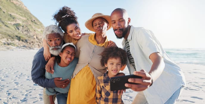 Selfie, hug and happy family at a beach for travel, fun or adventure in nature together. Love, profile picture and African kids with parents and grandparents at the sea for summer, vacation or trip.