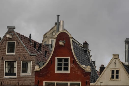 amsterdam ancient buildings over canals, netherlands