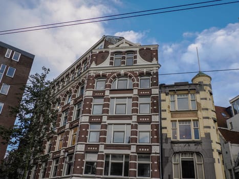 amsterdam ancient buildings over canals, netherlands