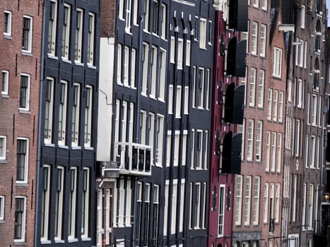 amsterdam ancient buildings over canals, netherlands