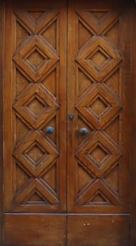 Old door in medieval district, Bergamo, Italy concept photo. Urban architectural photography. High quality picture