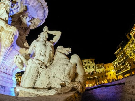 Neptune fountain trento dome night view at christmas time