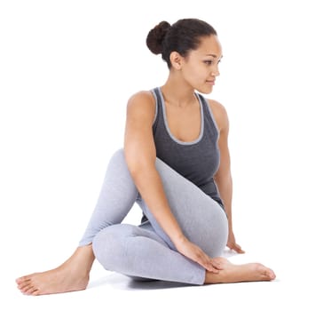 Yoga, stretching and woman in studio for fitness, workout and zen exercise with holistic wellness or muscle health. Flexible and young person with half lord of the fishes pose on a white background.