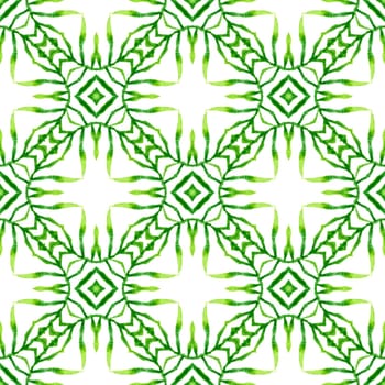 Ikat repeating swimwear design. Green mesmeric boho chic summer design. Textile ready cool print, swimwear fabric, wallpaper, wrapping. Watercolor ikat repeating tile border.