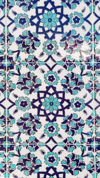 Turkey, Alanya, September 25, 2021, vertical background of ceramic tiles with beautiful oriental pattern in blue-white and turquoise colors