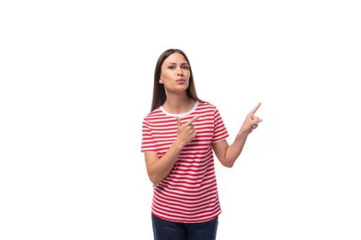 pretty young caucasian promoter woman with straight hair in glasses and in a striped red t-shirt on a white background with copy space.