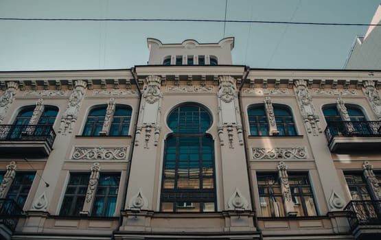Morning Kharkiv city center building with panoramic windows photo. The historical center with old architecture. High quality picture for wallpaper, travel blog.