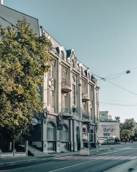 City center building with panoramic windows photo, Kharkiv, Ukraine. The historical center with old architecture. High quality picture for wallpaper, travel blog.