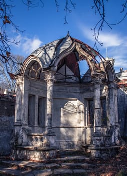 Ruined gazebo in the park concept photo. Autumn morning in Sharovka palace, Kharkiv, Ukraine. Neo-gothic building in European town. High quality altanka picture for wallpaper