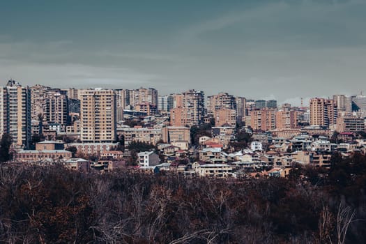 Cityscape in a day time view in full color concept photo. Beautiful urban scenery from parkland photography. District scene. High quality picture for magazine, article