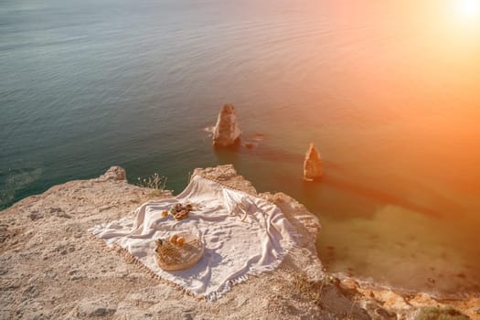 picnic on a hill overlooking the sea