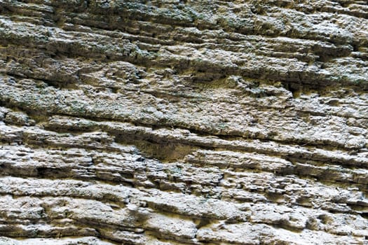 Stone wall with different stones. Texture, various natural stones