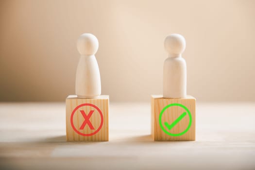 People showcase right and wrong on wooden blocks thinking yes or no. Business dilemma illustrated with true and false symbols on wood. Decision-making concept demonstrated. Think With Yes Or No Choice