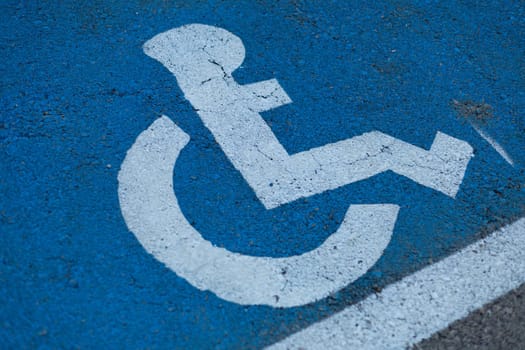 Markings on the road Place for people with disabilities. High quality photo