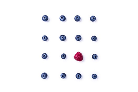 Pattern with raspberry and blueberries on isolated white background.