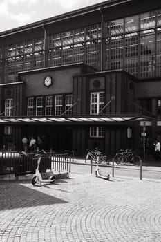 Greyscale shot of the historic facade of the Friedrichstrasse train station in Berlin, Germany