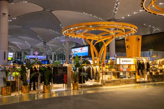 ISTANBUL, TURKEY - August 09, 2022: A view of duty free shops and stores at the international departure terminal of New International Istanbul Airport