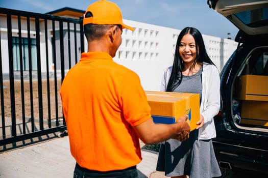 Home delivery concept portrayed as a courier delivers a cardboard parcel to a smiling woman customer at her house door emphasizing efficient and modern delivery service.