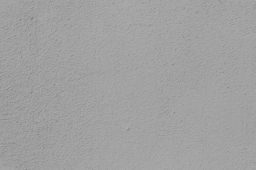 Light gray cement wall background in vintage style for graphic design or wallpaper.