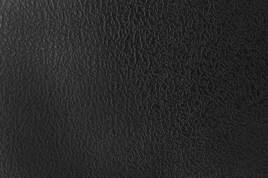 Dark stained steel texture. Conceptual image of a painted metal surface.