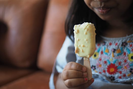 Child Hand Holding Ice Cream.
