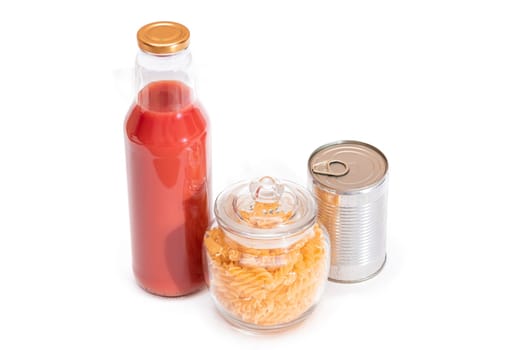 Food Reserves: Canned Food, Spaghetti, Pate, Tuna, Tomato Juice, Pasta, Fish and Grocery - Isolated on White Background. Emergency Food Storage in Case of Crisis. Strategic Food Supplies - Isolation