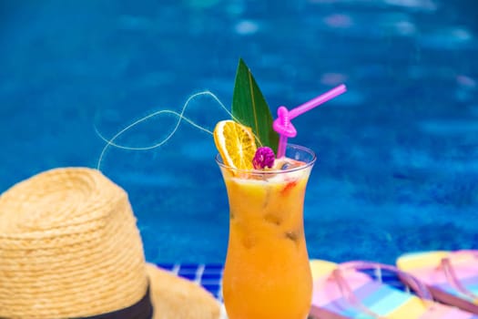 Beautiful cocktail by the pool. Selective focus. Drinks.