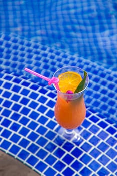 Beautiful cocktail by the pool. Selective focus. Drinks.