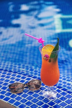 Beautiful cocktail by the pool. Selective focus. Drinks.