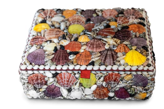 Beautiful decorative box decorated with sea shells of different colors. Presented on a white background.