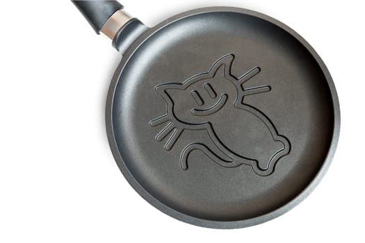 Comfortable cast iron pan with a ceramic coating to make pancakes. Presented on a white background.
