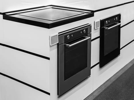 In the store on display demonstrates modern electric oven.
