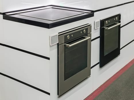 In the store on display demonstrates modern electric oven.