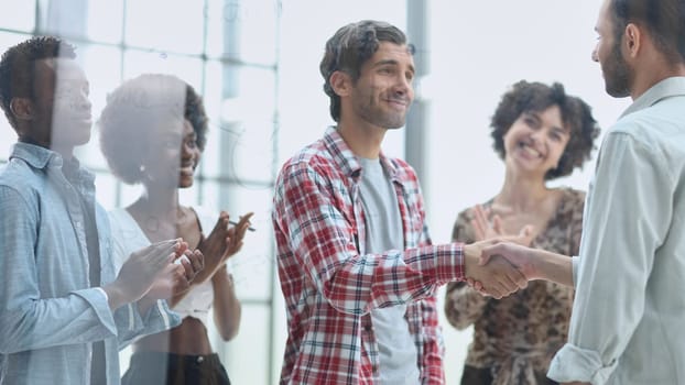 In a modern office. a diverse team of managers at a company meeting to discuss business projects.