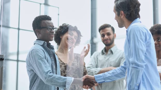 In a modern office. a diverse team of managers at a company meeting to discuss business projects.