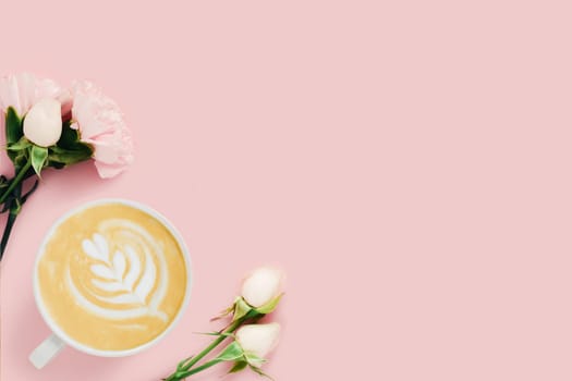 Tasty coffee surrounded by white roses on pink background.