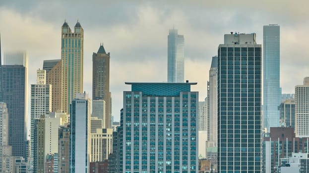 Image of Foggy downtown skyscraper buildings in Chicago aerial, gloomy big city, daytime