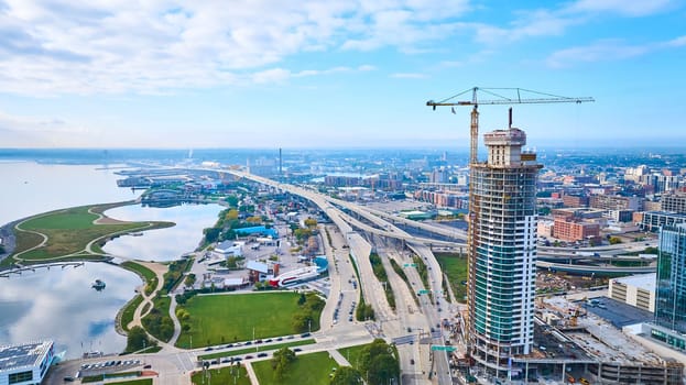 Aerial View of Skyscraper Construction in Bustling Milwaukee Cityscape, Captured by DJI Mavic 3 Drone in 2023